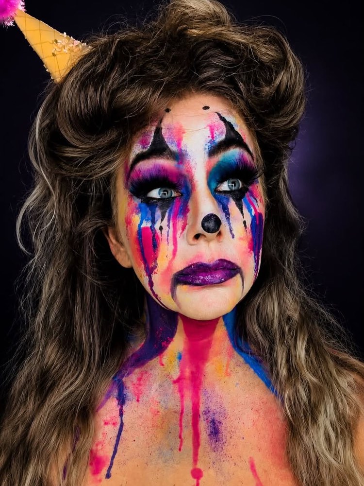 Kleurrijke feestclown look met druipende verf